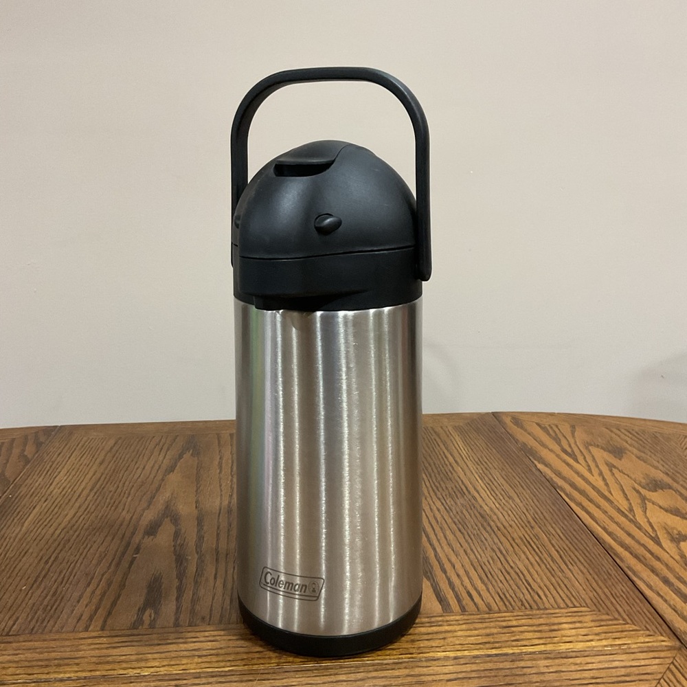 Coleman Silver and Black Beverage Dispenser/Airpot thermos unused